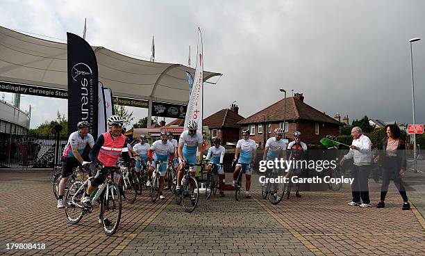 Former International umpire Dickie Bird signals the start for Laureus Academy Ambassador Michael Vaughan and his fellow riders in the PruProtect...