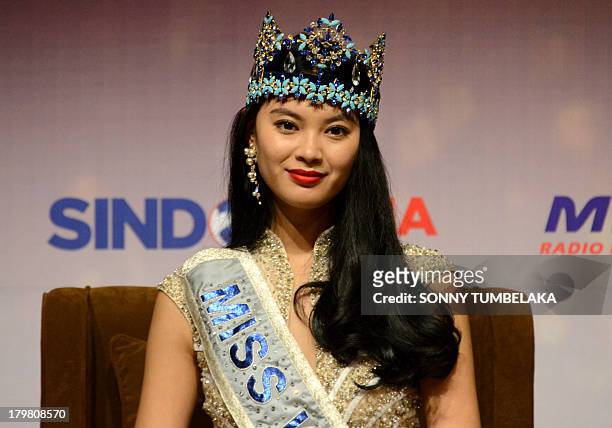 WenXia Yu of China attends a press conference a day before the opening ceremony of Miss World in Nusa Dua resort island of Bali on September 7, 2013....