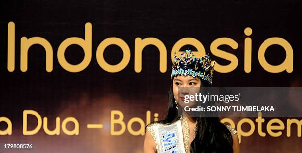 WenXia Yu of China attends a press conference a day before the opening ceremony of Miss World in Nusa Dua resort island of Bali on September 7, 2013....