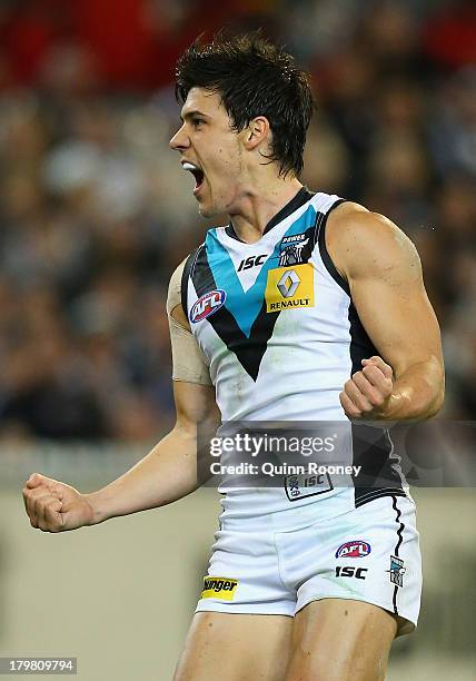 Angus Monfries of the Power celebrates kicking a goal during the Second AFL Elimination Final match between the Collingwood Magpies and the Port...