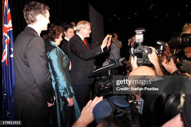 Australian Labor Party Leader, Kevin Rudd and Therese Rein on stage as Rudd concedes defeat in the 2013 Australian election, at The Gabba on...