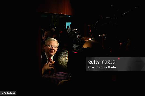 Australian Labor Party Leader, Kevin Rudd leaves after he concedes defeat in the 2013 Australian election, at The Gabba on September 7, 2013 in...