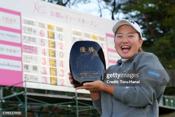 Yumeka Kobayashi of Japan poses with the trophy after winning the tournament following the final round of Kyoto Ladies Open at Joyo Country Club on...