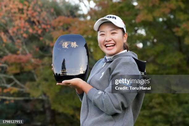 Yumeka Kobayashi of Japan poses with the trophy after winning the tournament following the final round of Kyoto Ladies Open at Joyo Country Club on...