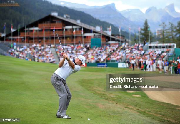 Craig Lee of Scotland plays into the 18th green during the third round of the Omega European Masters at the Crans-sur-Sierre Golf Club on September...