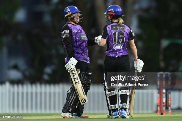 Lizelle Lee and Nicola Carey of the Hurricanes react during the WBBL match between Melbourne Stars and Hobart Hurricanes at Allan Border Field, on...