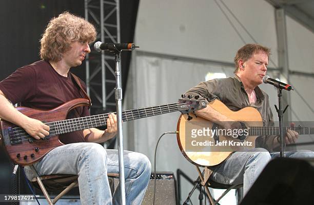 Mike Gordon and Leo Kottke during 2003 Bonnaroo Music Festival Night Two at Bonnaroo Fairgrounds in Manchester, Tennessee, United States.