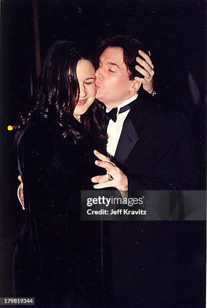 Robin Ruzan and Mike Myers during American Film Institute Honors Harrison Ford with 2000 Lifetime Achievement Award at Beverly Hilton Hotel in...