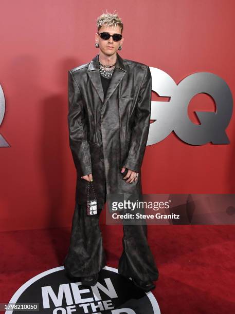 Machine Gun Kelly arrives at the 2023 GQ Men Of The Year at Bar Marmont on November 16, 2023 in Los Angeles, California.