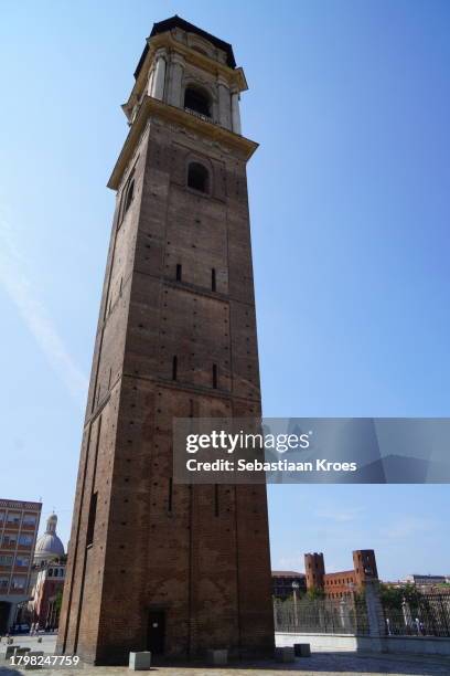 torre campanaria bell tower and porta palatina, torino, italy - porta palatina stock pictures, royalty-free photos & images