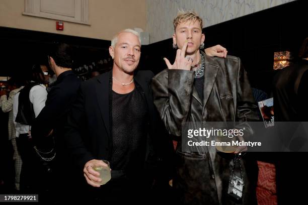 Diplo and Machine Gun Kelly attend the GQ Men of the Year Party 2023 at Bar Marmont on November 16, 2023 in Los Angeles, California.