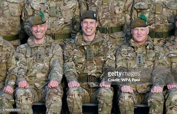 Prince William, Prince of Wales, Colonel-in-Chief, 1st Battalion Mercian Regiment joins members of the battalion for a group photograph during a...