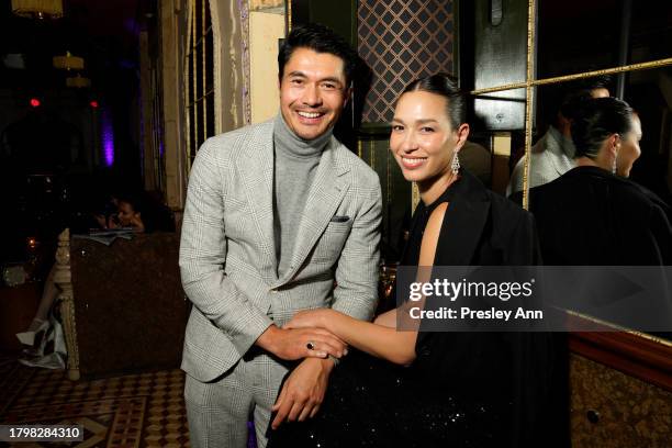 Henry Golding and Liv Lo attend the GQ Men of the Year Party 2023 at Bar Marmont on November 16, 2023 in Los Angeles, California.