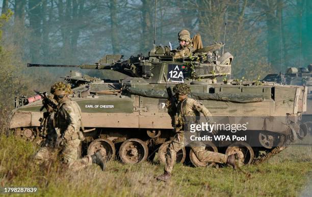 Prince William, Prince of Wales, Colonel-in-Chief, 1st Battalion Mercian Regiment rides in a Warrior Armoured Fighting Vehicle as he takes part in an...