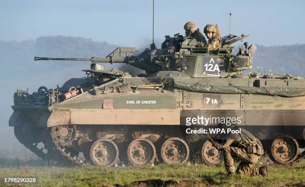 Prince William, Prince of Wales, Colonel-in-Chief, 1st Battalion Mercian Regiment rides in a Warrior Armoured Fighting Vehicle as he takes part in an...