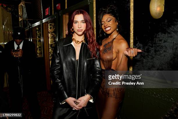 Dua Lipa and Megan Thee Stallion attend the GQ Men of the Year Party 2023 at Bar Marmont on November 16, 2023 in Los Angeles, California.