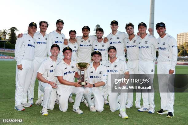 Western Australia pose with the Rod Marsh Cup after defeating South Australia during the Sheffield Shield match between Western Australia and South...