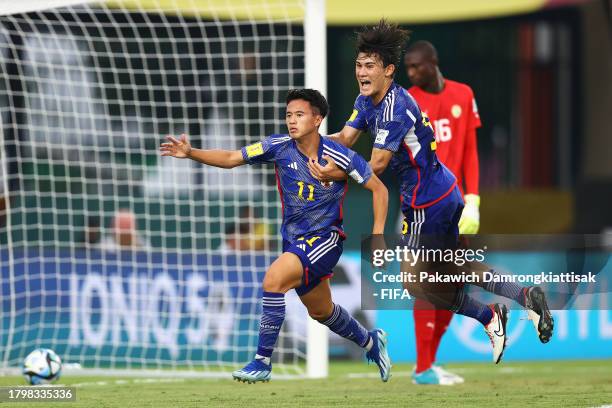 Rento Takaoka of Japan celebrates after scoring the team's first goal during the Group D match between Senegal and Japan during the FIFA U-17 World...