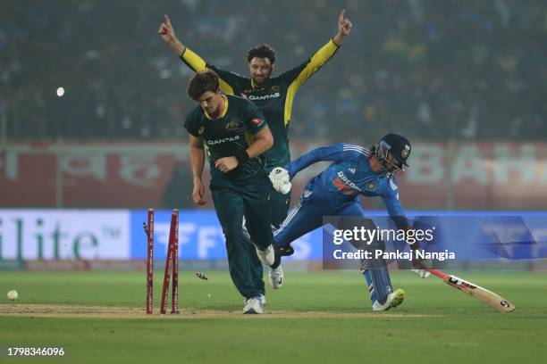 Australia's Sean Abbott run out to India's Ravi Bishnoi during game one of the T20 International Series between India and Australia at Dr YS...