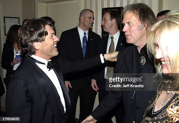 Jann Wenner, Neil Young with guest during 20th Annual Rock and Roll Hall of Fame Induction Ceremony - Audience and Backstage at Waldorf Astoria Hotel...