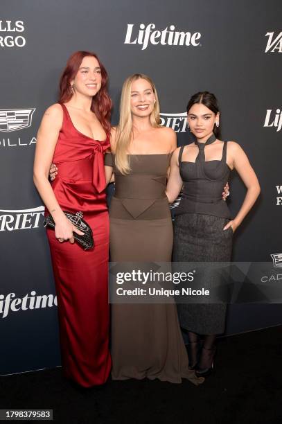 Dua Lipa, Margot Robbie and Ariana Greenblatt attend the 2023 Variety Power Of Women at Mother Wolf on November 16, 2023 in Los Angeles, California.