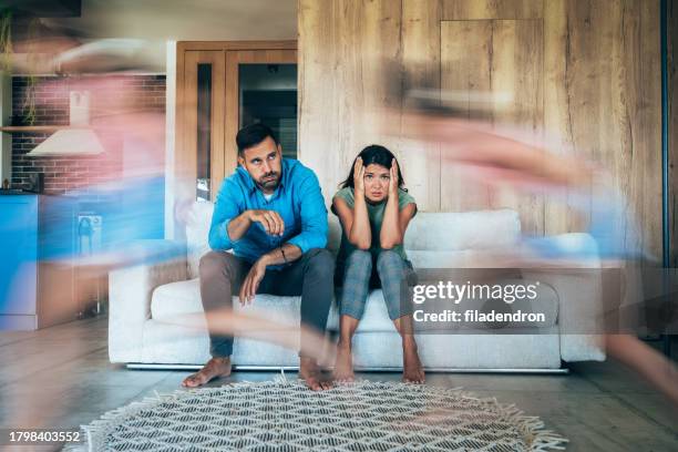 parents tired of noisy children who are running and shouting - runner tired stockfoto's en -beelden