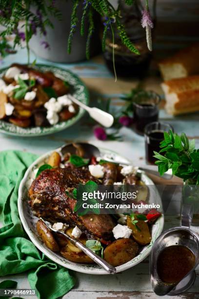 slow cooked greek lamb with lemon garlic potatoes lamb kleftiko - easter lamb stock pictures, royalty-free photos & images