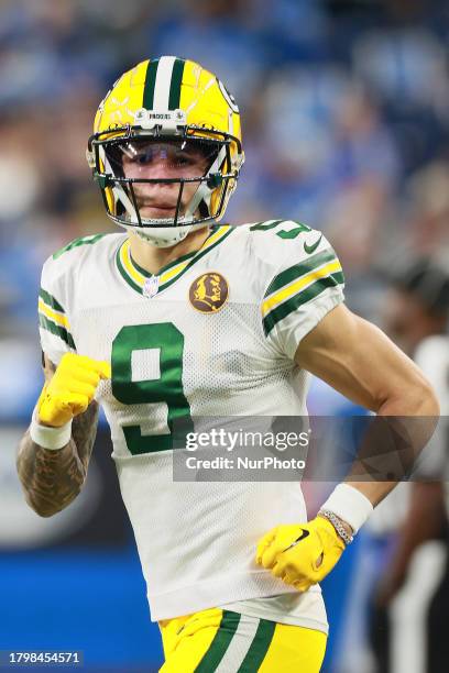 Green Bay Packers wide receiver Christian Watson runs on the field ahead of an NFL Thanksgiving Day football game between the Detroit Lions and the...