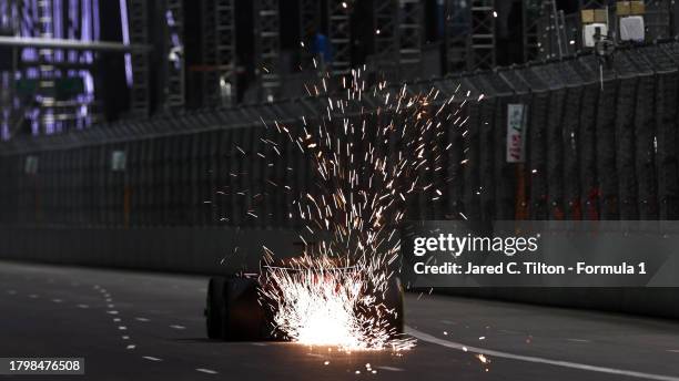 Sparks fly behind the car of Charles Leclerc of Monaco driving the Ferrari SF-23 during practice ahead of the F1 Grand Prix of Las Vegas at Las Vegas...