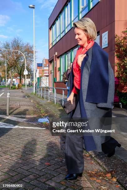 Queen Mathilde of Belgium visits the GVKS Groenendaal school during the Reading for Children week on November 17, 2023 in Merksem, Belgium.
