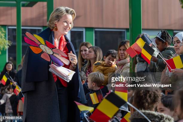 Queen Mathilde of Belgium visits the GVKS Groenendaal school during the Reading for Children week on November 17, 2023 in Merksem, Belgium.