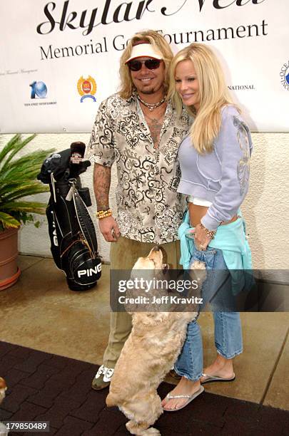 Vince Neil and wife Lia Gerardini during 2005 Skylar Neil Memorial Golf Tournament for TJ Martell at Malibu Country Club in Malibu, California,...