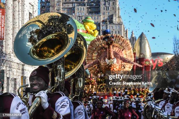 People participate in Macy's annual Thanksgiving Day Parade on November 23, 2023 in New York City. Thousands of people lined the streets to watch the...