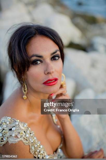 Italian actress and producer Maria Grazia Cucinotta poses for a portrait session as part of the 70th Venice International Film Festival on September...