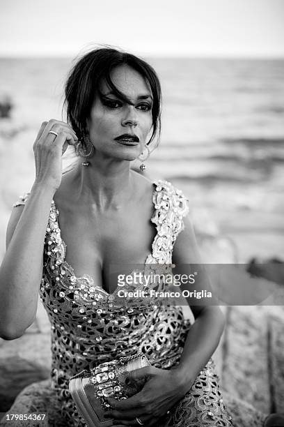 Italian actress and producer Maria Grazia Cucinotta poses for a portrait session as part of the 70th Venice International Film Festival on September...