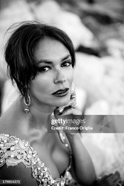 Italian actress and producer Maria Grazia Cucinotta poses for a portrait session as part of the 70th Venice International Film Festival on September...