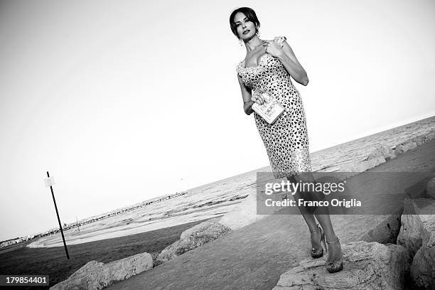 Italian actress and producer Maria Grazia Cucinotta poses for a portrait session as part of the 70th Venice International Film Festival on September...