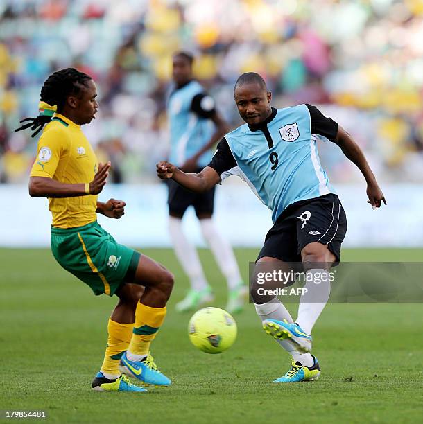 South Africa's Siphiwe Tshabalala vies with Botswana's Jerome Ramatlhakwana during a 2014 FIFA World Cup Qualifying football match South Africa vs...