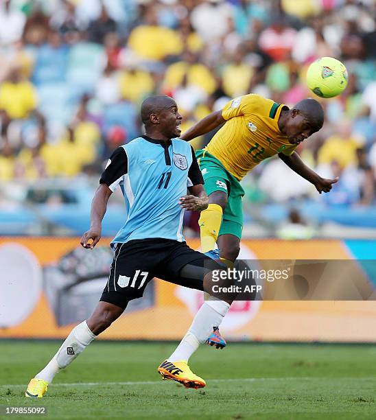 South Africa's Thabo Matlaba vies with Botswana's Mogakolodi Ngele during a 2014 FIFA World Cup Qualifying football match South Africa vs Botswana at...