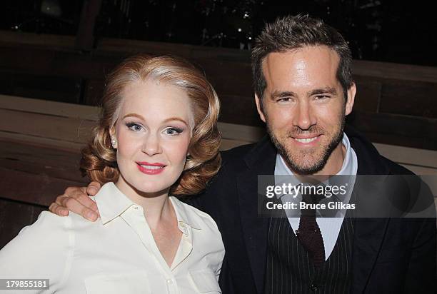 Kate Baldwin and Ryan Reynolds pose backstage at the musical "Big Fish" on Broadway at The Neil Simon Theater on September 6, 2013 in New York City.