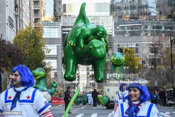 Dinosaur balloon floats in Macy's annual Thanksgiving Day Parade on November 23, 2023 in New York City. Thousands of people lined the streets to...