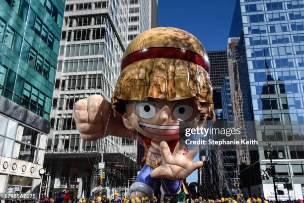 The Monkey D. Luffy balloon floats in Macy's annual Thanksgiving Day Parade on November 23, 2023 in New York City. Thousands of people lined the...