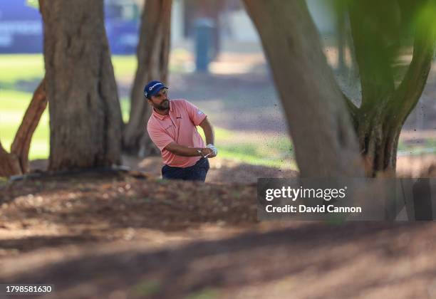 Romain Langasque of France plays his second shot from the trees on the 15th hole during the second round on Day Two of the DP World Tour Championship...