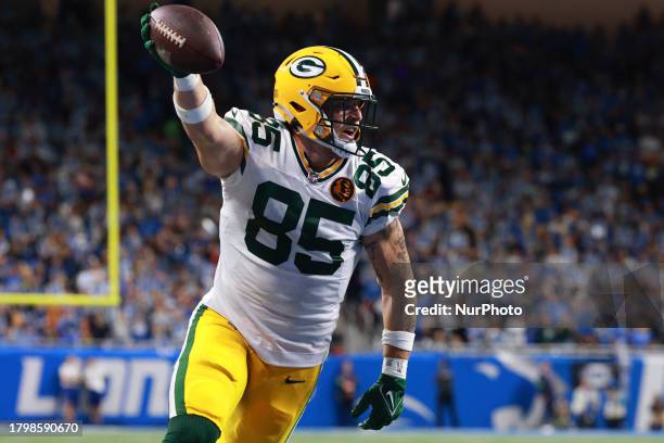 Green Bay Packers tight end Tucker Kraft scores a touchdown during the first half of an NFL football game between the Green Bay Packers and the...
