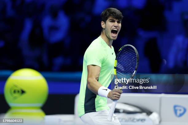 Carlos Alcaraz of Spain celebrates breaking a serve against Daniil Medvedev in the Men's Singles Round Robin match on day six of the Nitto ATP Finals...