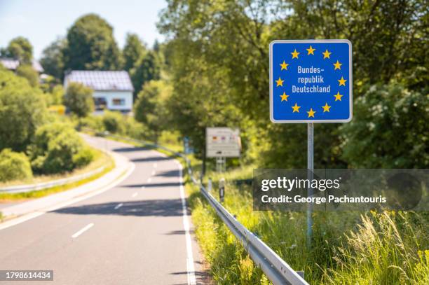 germany border sign in the schengen zone - eu road sign stock pictures, royalty-free photos & images