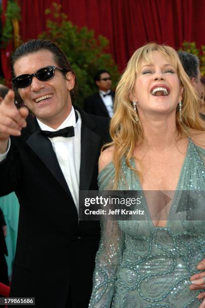 Antonio Banderas and Melanie Griffith during The 77th Annual Academy Awards - Arrivals at Kodak Theatre in Los Angeles, California, United States.