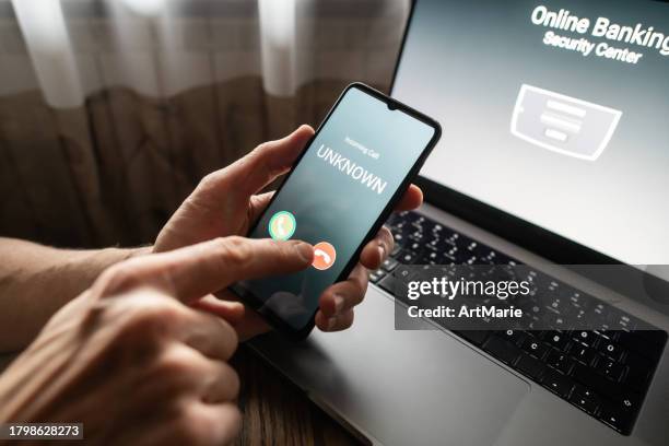 senior man refuses to answer to a call from unknown number. scam and fraud prevention with smartphone concept. - fraud prevention stock pictures, royalty-free photos & images