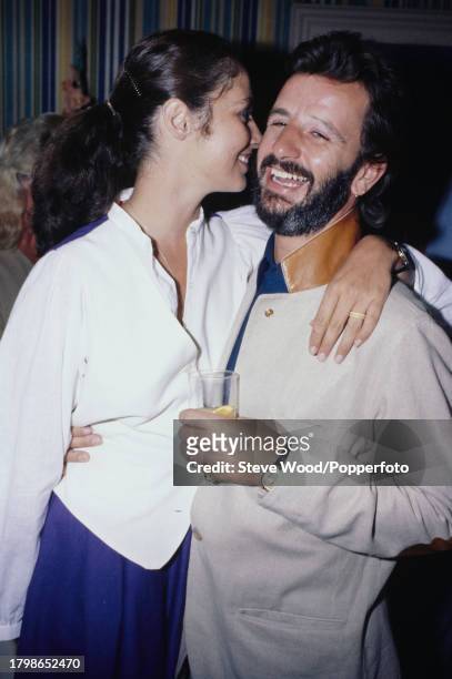 Former Beatles drummer Ringo Starr with his American partner and model Nancy Lee Andrews at a party, circa 1978.