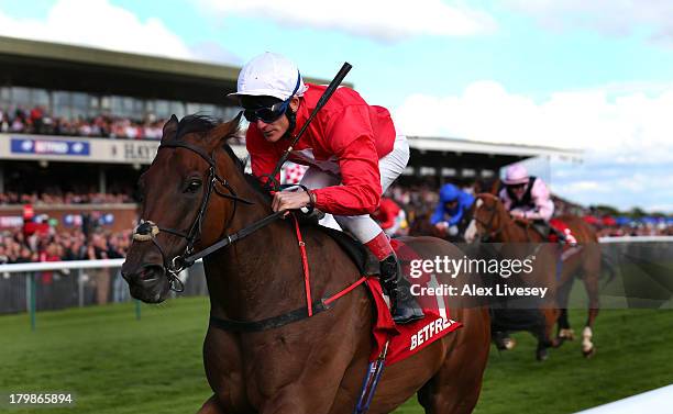 Gordon Lord Byron ridden by Johnny Murtagh wins The Betfred Sprint Cup held at Haydock Racecourse on September 7, 2013 in Haydock, England.